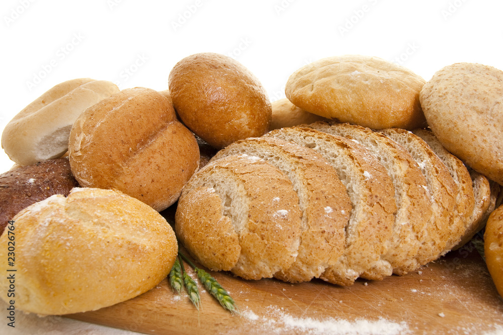 bread on a wooden board sprinkled with flour bread on a wooden board sprinkled with flour