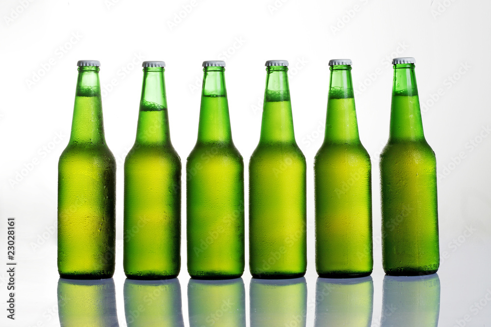 Beer in bottle on a white background .