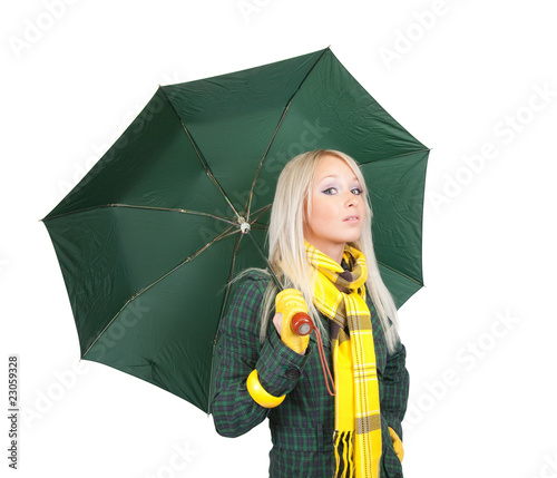 Blonde girl  in green coat  with umbrella photo