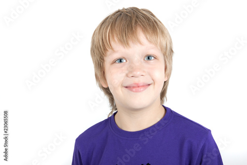 Young boy smiles