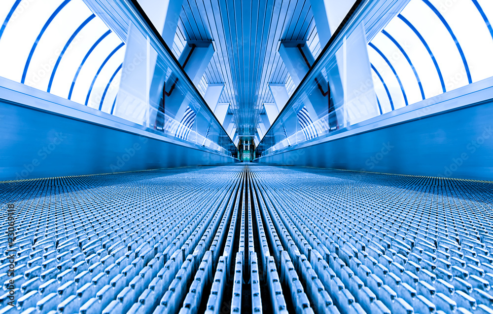 Fototapeta premium blue modern escalator in business center