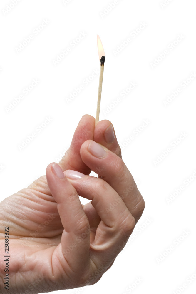 hand holding a matchstick hand holding a matchstick