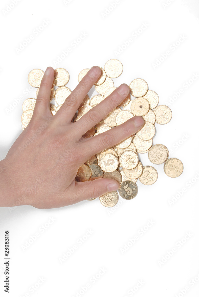 hand reaching greedily for some coins hand reaching greedily for some coins
