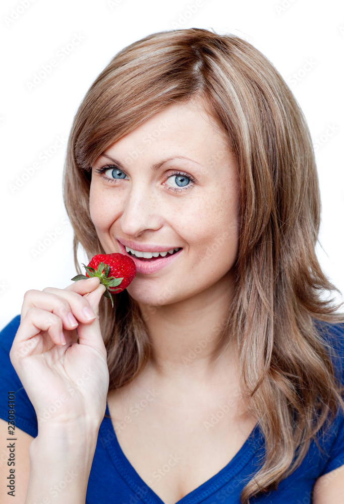 Radiant woman eating strawberries Radiant woman eating strawberries
