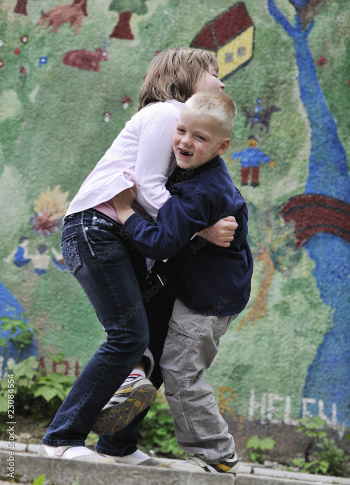 Obraz premium happy brother and sister outdoor in park