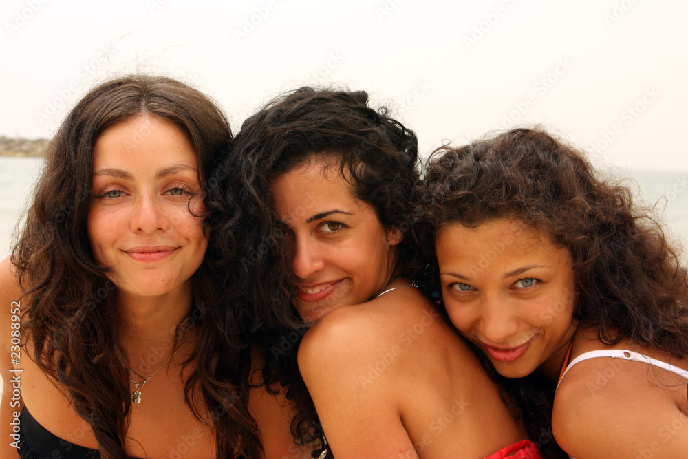 three girlfriends on the beach three girlfriends on the beach