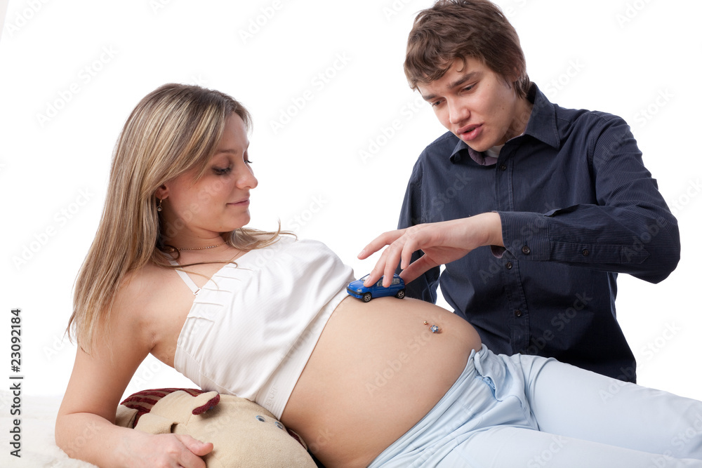Happy pregnant family.