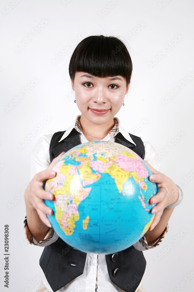 businesswoman holding a globe on white background businesswoman holding a globe on white background