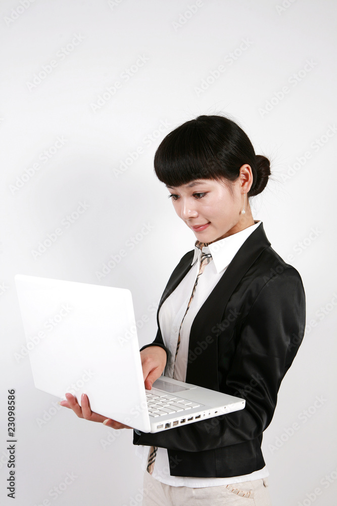 Businesswoman and portable computers on white Businesswoman and portable computers on white