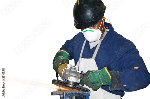 A man grinding a piece of metal (isolated)