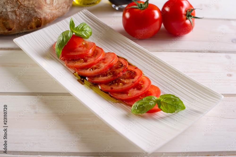 omatoes salad on dish-insalata di pomodori omatoes salad on dish-insalata di pomodori