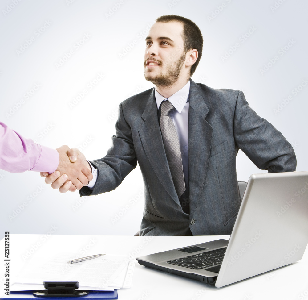 Deal! Young businessman makes a new contract Deal! Young businessman makes a new contract