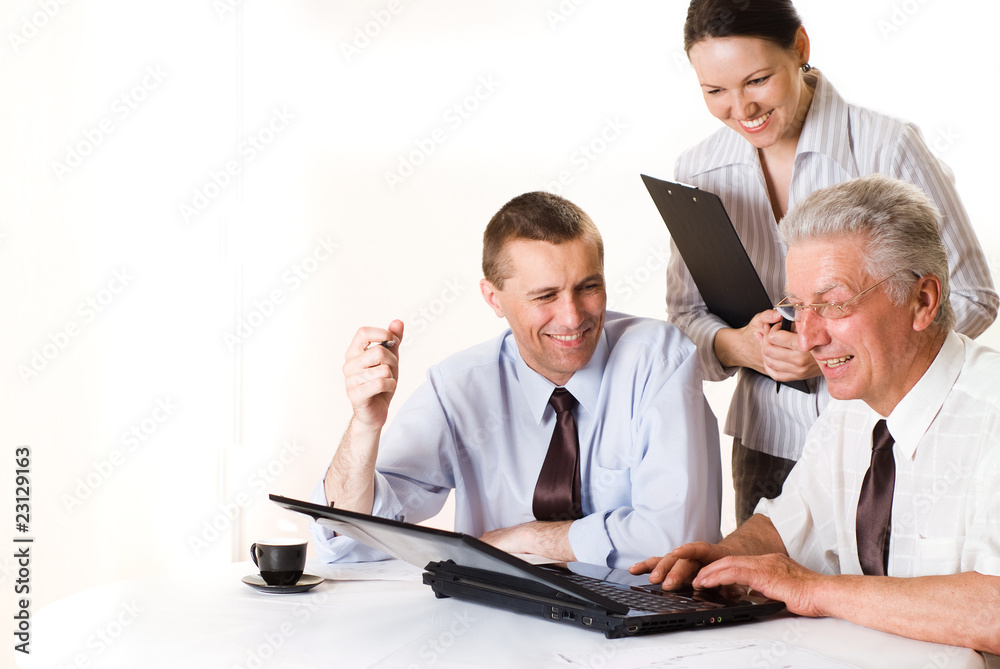 Obraz premium Three businessmen working