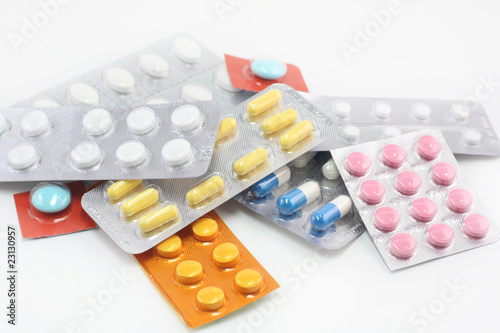 huge number of different pills: aspirin, vitamins, Panadol