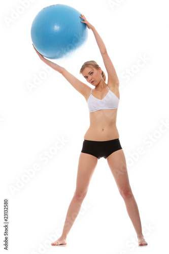 Woman exercising with fitness ball