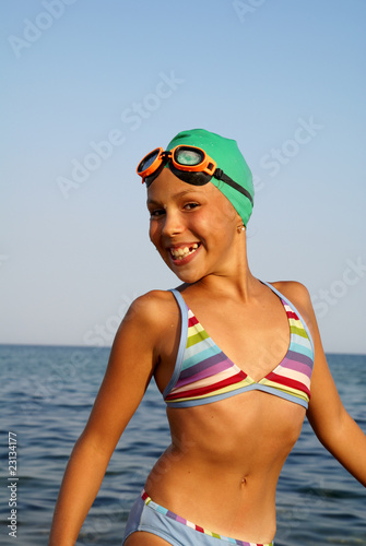 Preteen girl on sea beach Stock Photo | Adobe Stock
