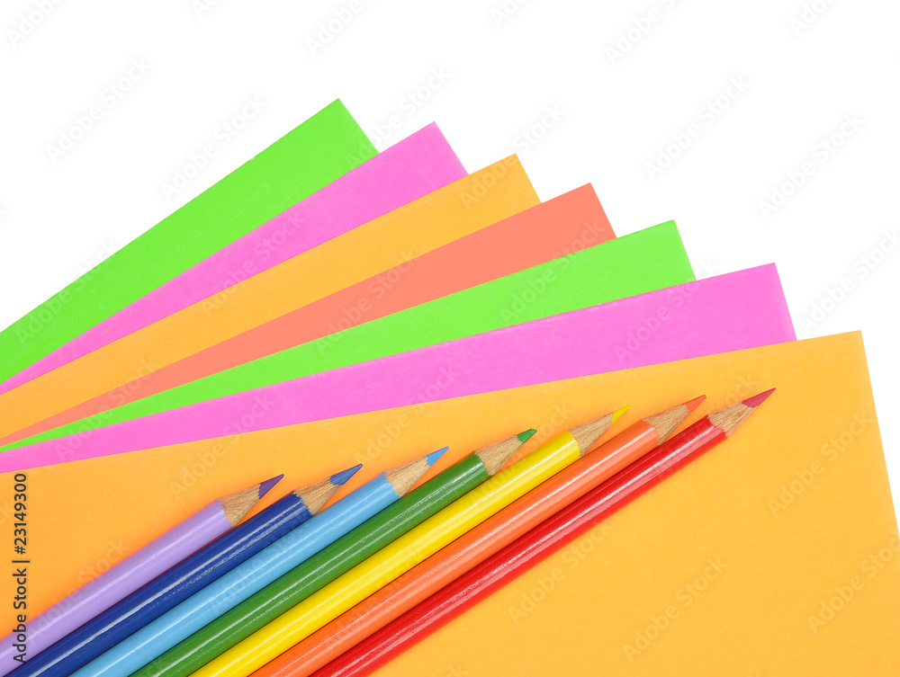Multicolored paper and pencils Multicolored paper and pencils