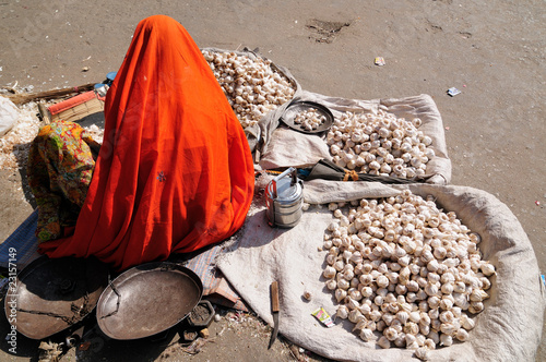 Indian Colorfully women seling the vegetables on the street photo