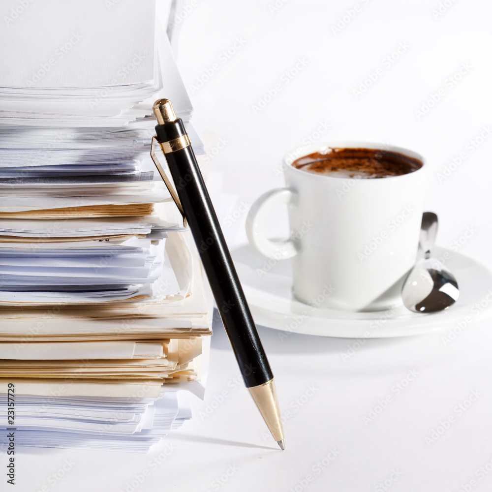 coffee and stack of paper