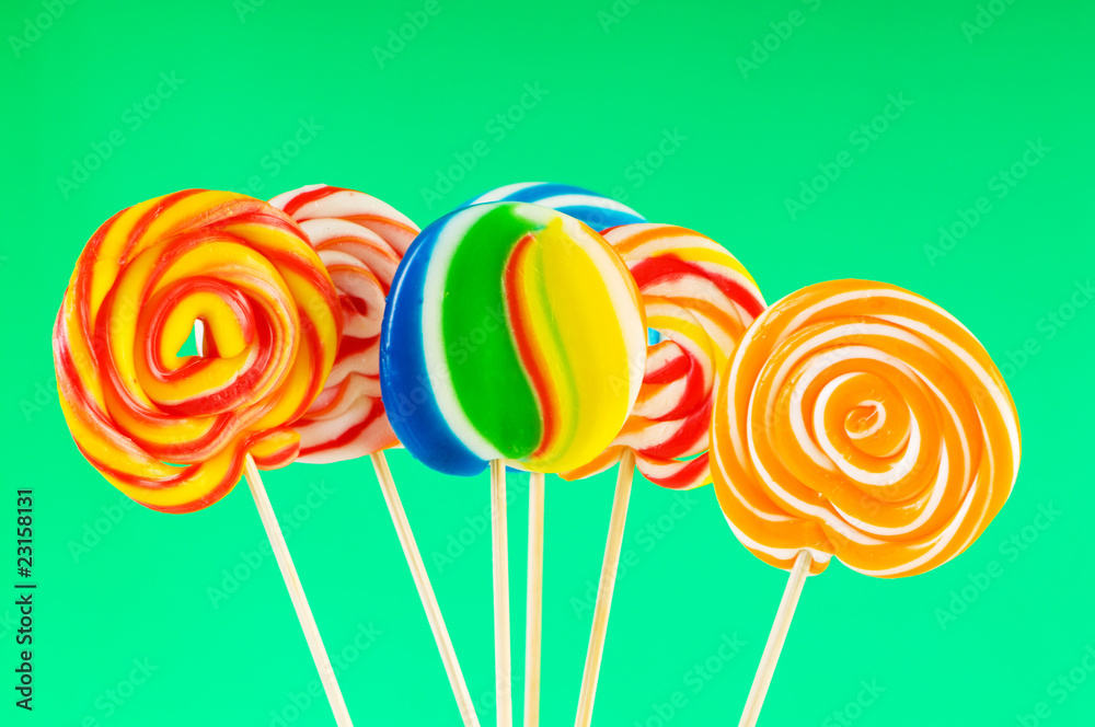 Colourful lollipop against the colourful background Colourful lollipop against the colourful background