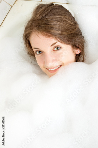 girl washes in a bath