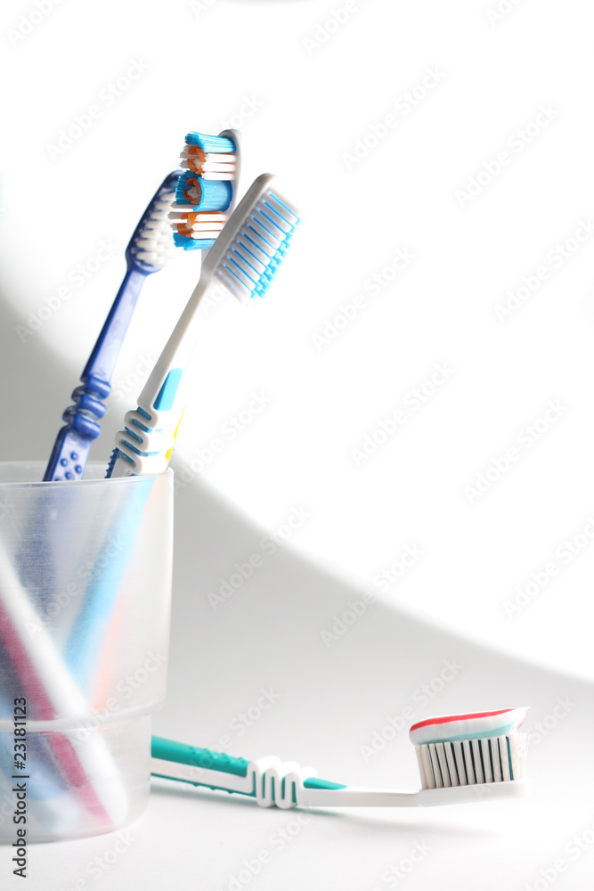 Toothbrushes in a glass Toothbrushes in a glass