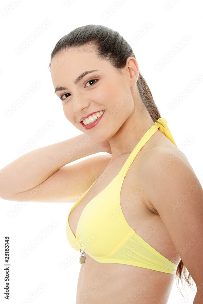Obraz premium Beautiful young caucasian woman in bikini