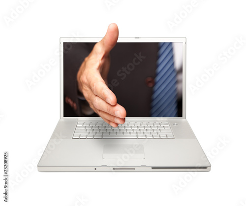 Man Reaching for a Handshake Through Laptop Screen