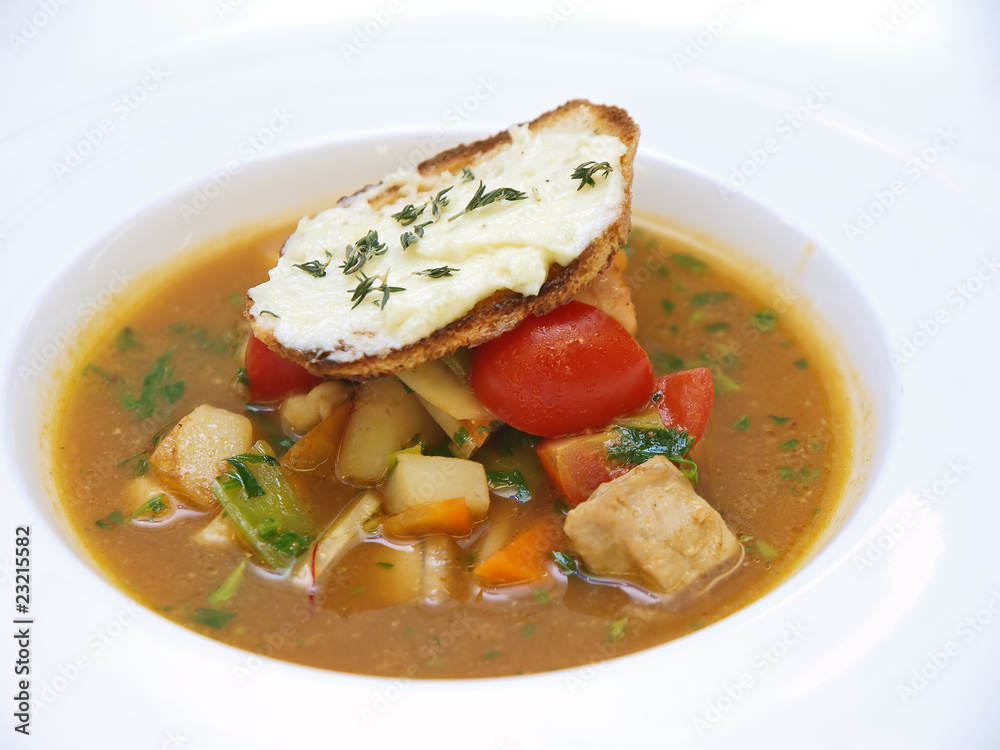 vegetable and meat soup served with crusty bread and butter vegetable and meat soup served with crusty bread and butter