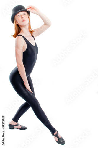 Attractive red headed jazz dancer in tights with Bowler