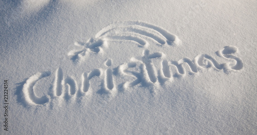 Word christmas written on snow