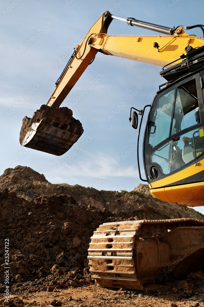 Fototapeta premium loader excavator works in a quarry