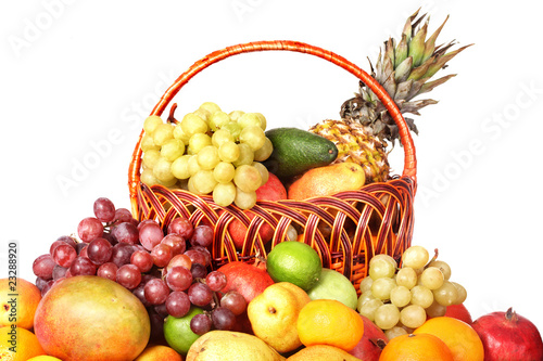 Fototapeta Naklejka Na Ścianę i Meble -  Group of colour fruit in basket. Isolated.
