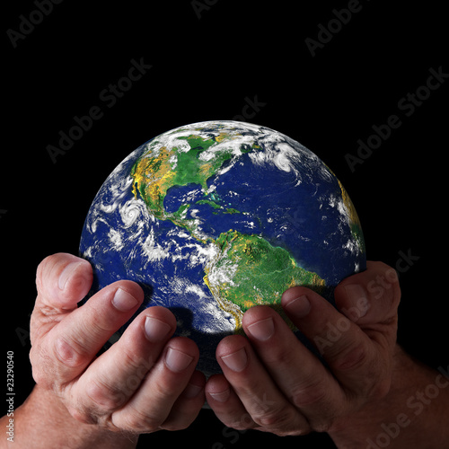 Hands holding world