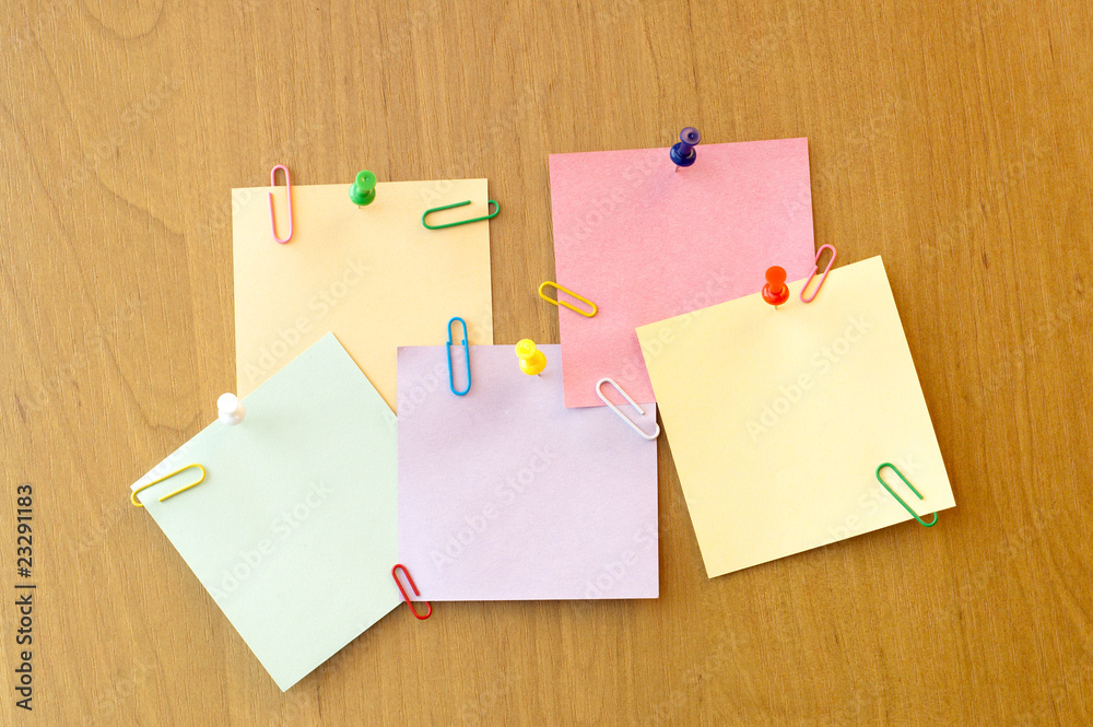 five sticker notes with pins and clips five sticker notes with pins and clips