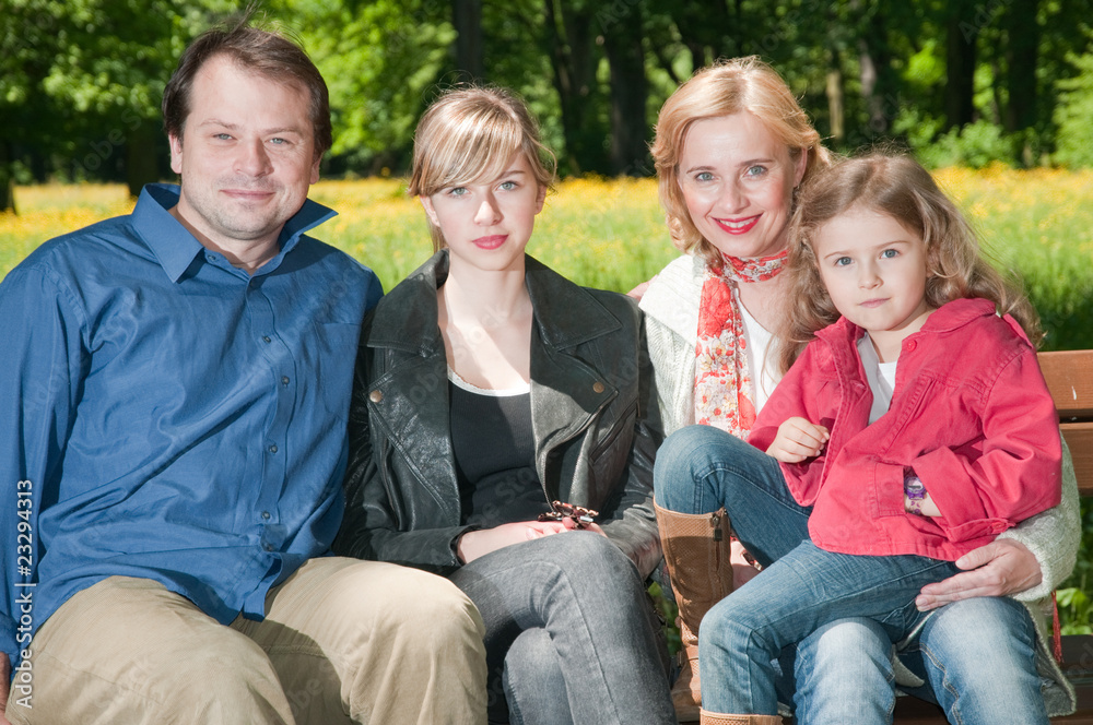 Happy family outdoor portrait