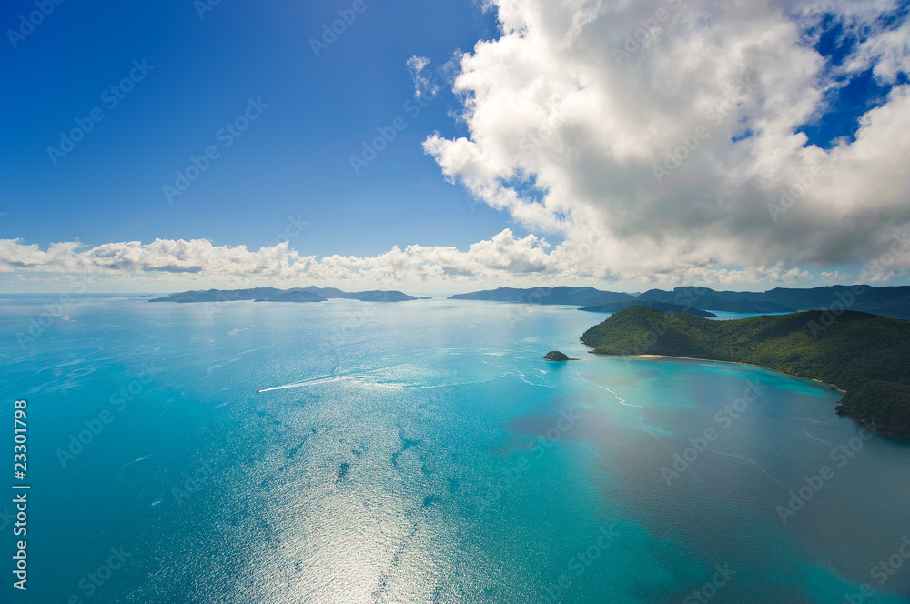 Aerial view of the Whitsunday Islands and brilliant ocean Aerial view of the Whitsunday Islands and brilliant ocean