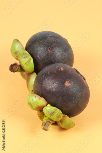 Two whole mangosteen