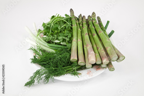 Assorted greens and vegetable isolated on white