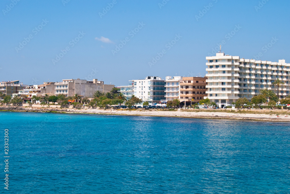 Sa Coma resort town and the beach of Mediterranean Sea