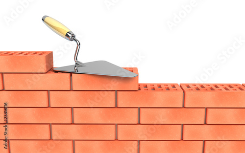 Fototapeta Naklejka Na Ścianę i Meble -  Trowel and bricks wall construction