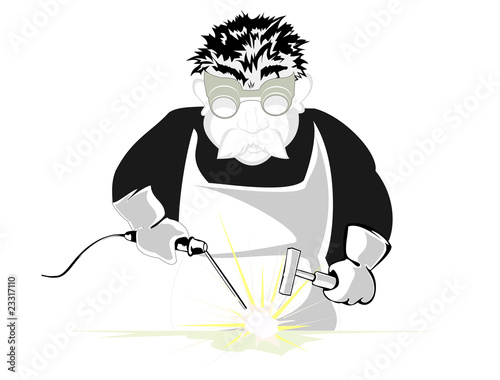 welder in glasses at work