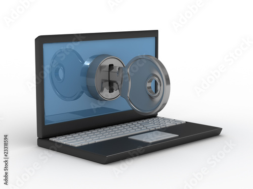 laptop and key on white bac...