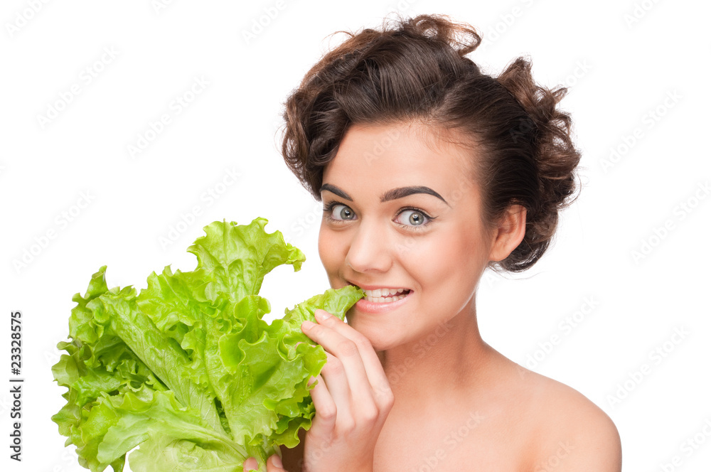 Closeup portrait of emotional beauty woman with green lettuce Closeup portrait of emotional beauty woman with green lettuce