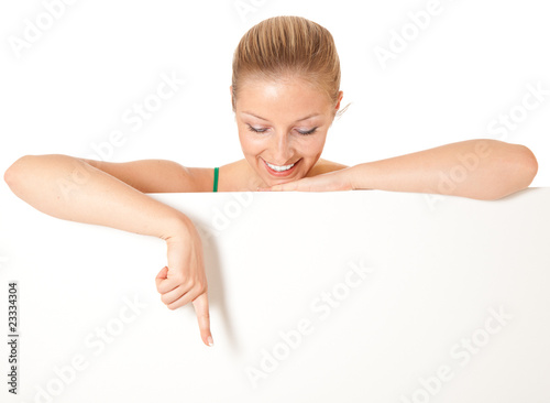 Caucasian blond woman peeping white board
