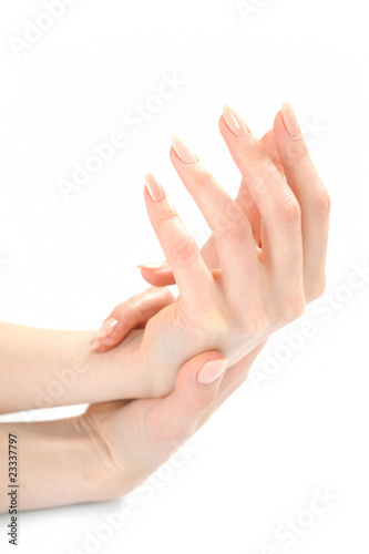 Beautiful Hands with perfect beige manicure. white background