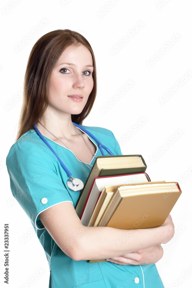 Portrait of female doctor in the green uniform with books. Portrait of female doctor in the green uniform with books.
