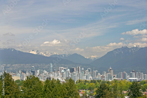 A downtown view with mountain background.