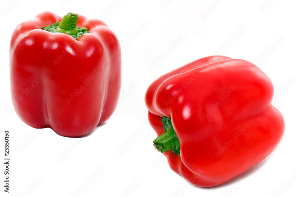 Two red paprikas isolated on white, studio shot Two red paprikas isolated on white, studio shot