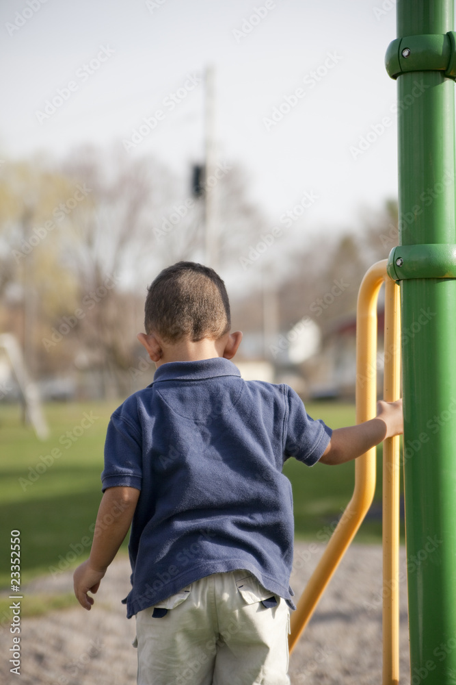 Fototapeta premium Multi-racial boy at the park